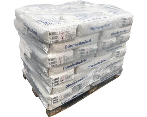 Palette mit Säcken Dünnbettmörtel, eingeschweißt in Folie