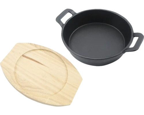 Poêle en fonte avec dessous de plat en bois