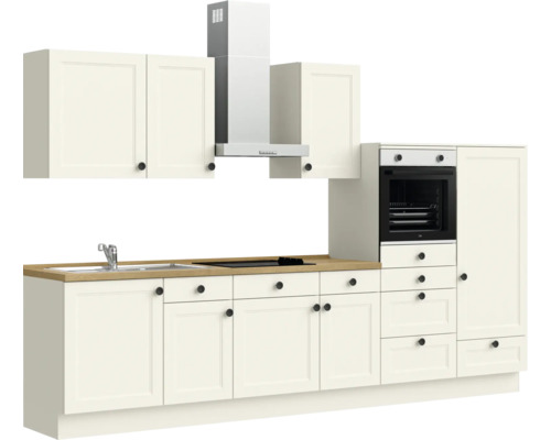 Cuisine complète avec évier, plaque de cuisson, hotte aspirante et four dans un design clair