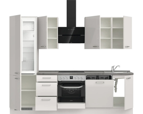 Cuisine moderne avec appareils intégrés et armoires blanches