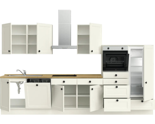 Cuisine équipée avec évier, hotte aspirante, tiroirs, placards, cuisinière et réfrigérateur.