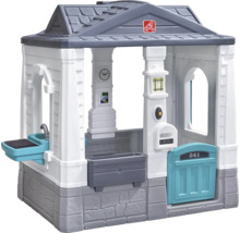 Maisonnette avec barbecue, boîte aux lettres et horloge