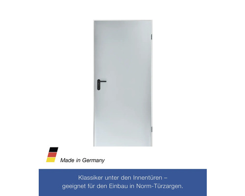 Weisse Innentür mit schwarzem Türgriff