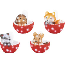 Figurines décoratives : hérisson, renard, raton laveur et souris dans une coquille de champignon rouge avec éclairage