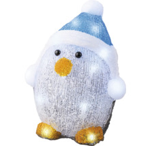 Pingouin décoratif avec bonnet et éclairage comme décoration de Noël