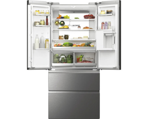 Réfrigérateur-congélateur ouvert avec aliments