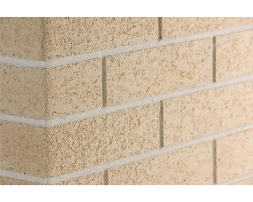 Angle pour pierre de parement Elabrick Napoli 24 x 7,1 cm extérieur Gros plan d''un angle de maçonnerie avec des briques