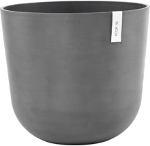 Pot de fleurs gris avec une forme arrondie