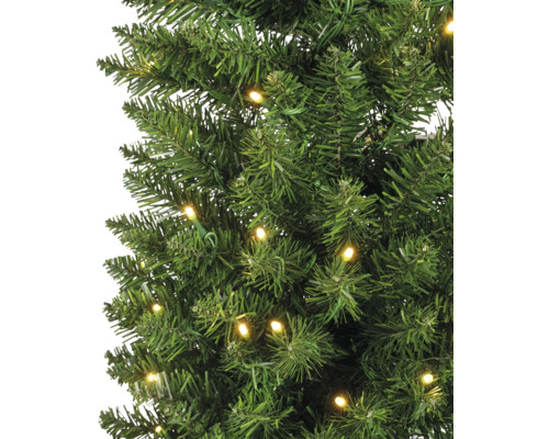 Gros plan d''un sapin de Noël artificiel avec éclairage