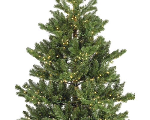 Vue détaillée d''un sapin de Noël artificiel avec éclairage