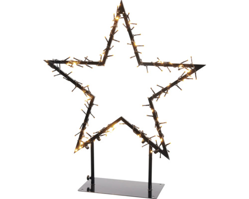 Décoration de Noël en forme d''étoile avec des lumières sur un support