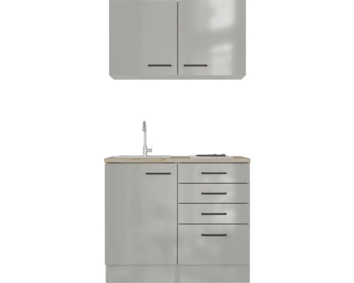 Cuisine équipée avec évier, robinet, tiroirs et éléments hauts