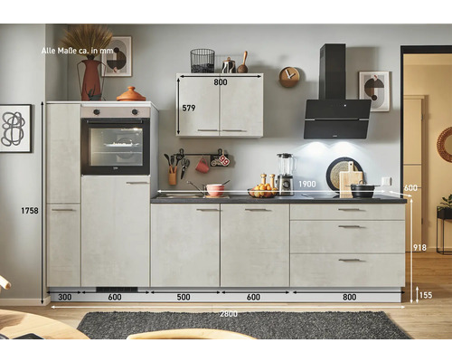 Cuisine équipée avec four, hotte aspirante et armoire suspendue