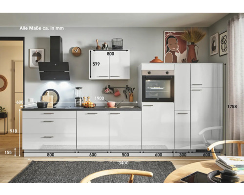 Cuisine intégrée avec plans de travail noirs et armoires blanches avec les dimensions