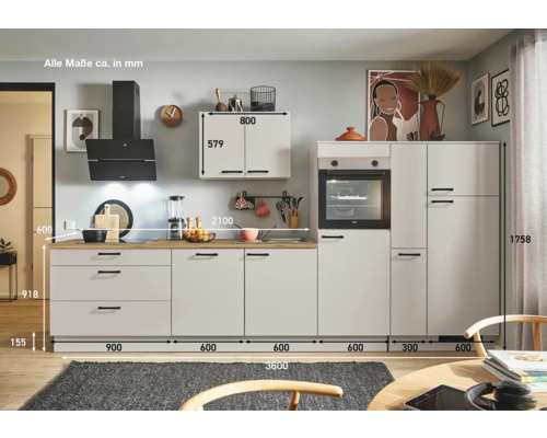 Cuisine moderne avec armoires grises, hotte aspirante et plan de travail en bois