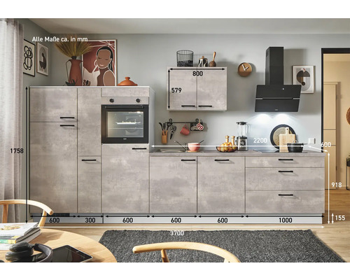 Cuisine équipée avec four encastrable, armoire suspendue et hotte aspirante