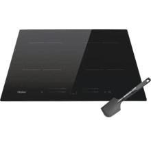 Plaque à induction Haier avec quatre zones de cuisson et spatule
