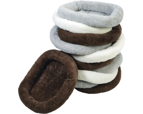 Pile de lits pour animaux de différentes couleurs