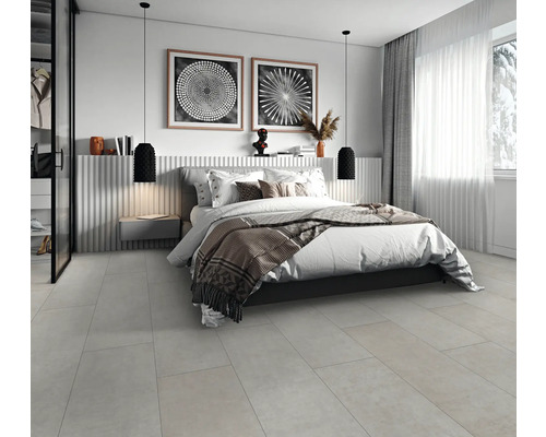 Modernes Schlafzimmer mit Doppelbett, Nachttisch, Pendelleuchten und Wandkunst