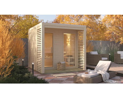 Chalet sauna Karibu Angkora 2 sans poêle avec fenêtre et porte tout verre en verre transparent Sauna de jardin en bois avec chaise longue et coin salon extérieur dans un environnement automnal