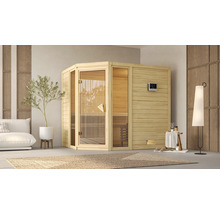 Sauna en bois avec porte en verre dans une pièce lumineuse avec canapé, plante et tapis