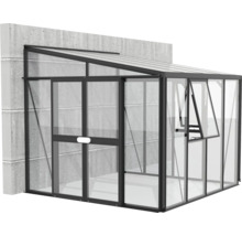 Serre en verre contre un mur