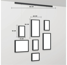 Hängegalerie mit mehreren Bilderrahmen unterschiedlicher Größe