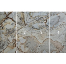 Quatre motifs différents de carreaux imitation marbre.