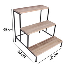 Étagère à fleurs à trois niveaux en bois et métal noir, dimensions 60 par 60 par 60 centimètres.