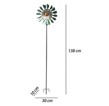 Éolienne de jardin en métal en forme de fleur avec une hauteur totale de 138 centimètres et un diamètre de 30 centimètres.