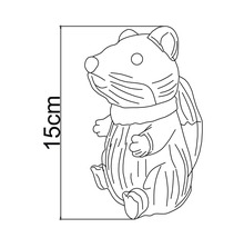 Figurine décorative hamster d'une hauteur de 15 centimètres.