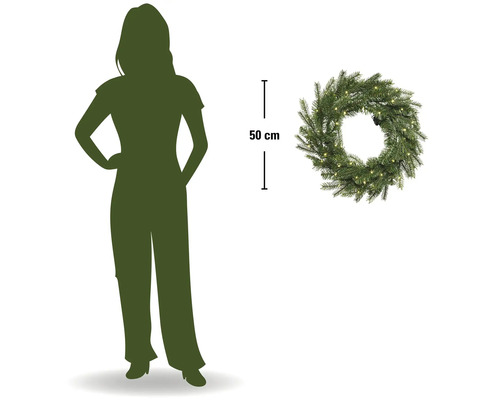 Couronne de Noël artificielle avec éclairage LED, diamètre 50 centimètres, comparaison de taille avec une personne.