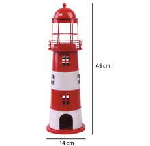Phare décoratif en métal rouge et blanc, hauteur 45 centimètres, largeur 14 centimètres.