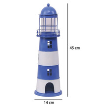 Phare décoratif en métal, rayé bleu et blanc, hauteur 45 centimètres, diamètre 14 centimètres.