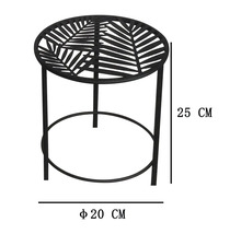 Tabouret de fleur en métal rond avec motif de feuilles, hauteur 25 centimètres, diamètre 20 centimètres
