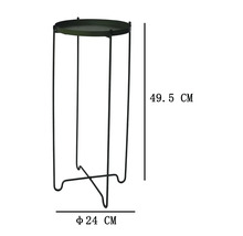 Support pour plantes rond en métal avec quatre pieds, un diamètre de 24 centimètres et une hauteur de 49,5 centimètres.